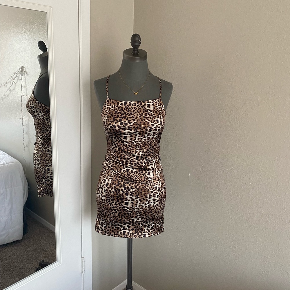 Animal print spandex open back mini dress
